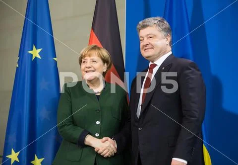 Angela Merkel and Petro Poroshenko Stock Photos