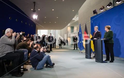 Angela Merkel and Petro Poroshenko Stock Photos