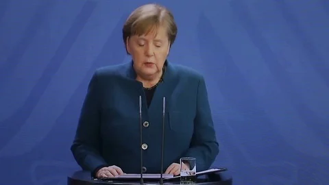 Angela Merkel introducing curfew, coronavirus epidemic in Germany Stock Footage