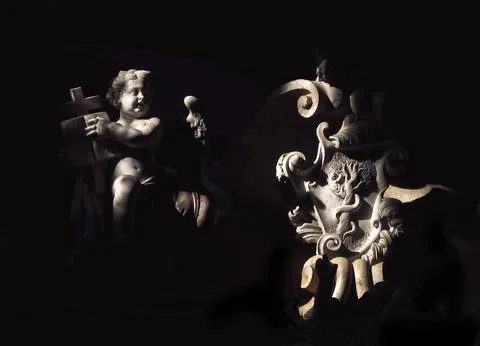 Angels and demons Stock Photos
