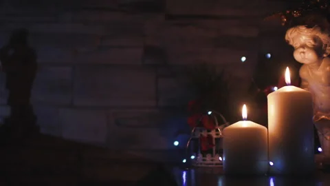 Angels at burning candles 스톡 동영상 237974125