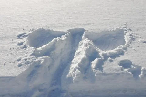 Angels in deep snow Stock Photos