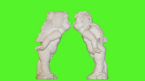 Angels on a green background Stock Photos