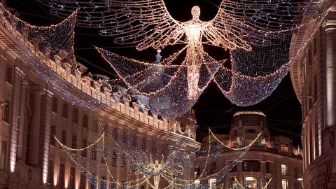 Angels of Light hanging over Regent Street London Stock Footage 70801058