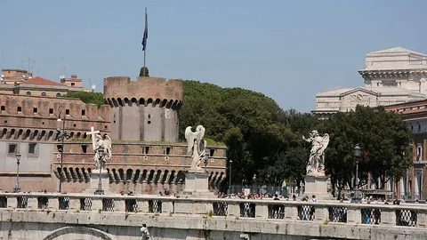 Angels statues on the Sant Angelo arch bridge over the Tiber river in Rome Stock Footage 95672946