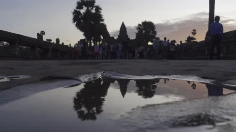 Angkor wat reflection ground tourists sunrise Stock Footage 225368869