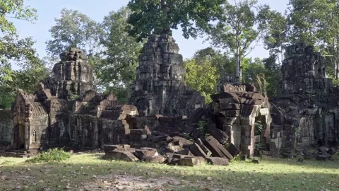 Angkor Wat, A remarkably tall building set against dense jungle backdrop Stock Footage 305379712