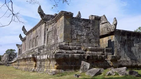 Angkor Wat, A remarkably tall building set against dense jungle backdrop Stock Footage 305383443