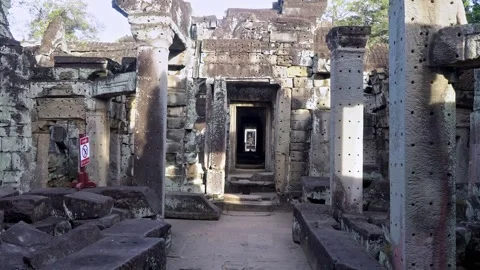 Angkor Wat, A remarkably tall building set against dense jungle backdrop Stock Footage 305384130