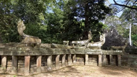 Angkor Wat, A remarkably tall building set against dense jungle backdrop Stock Footage 305384156