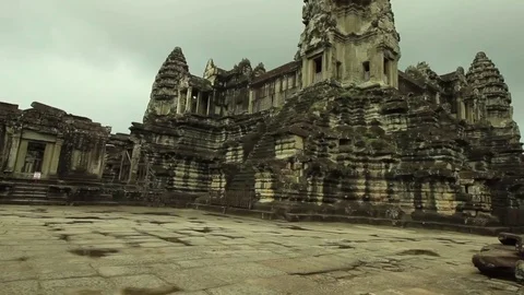 Angkor Wat temple seen from outside, smooth tilt from floor to towers Stock Footage 76381823