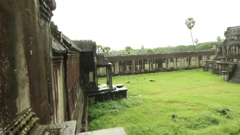 Angkor Wat temple, smooth tracking shot out window and into courtyard Stock Footage 76381547