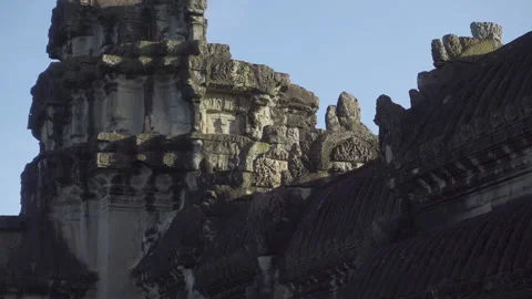 Angkor wat wall pan left morning blue sky shadow light Stock Footage 229597932
