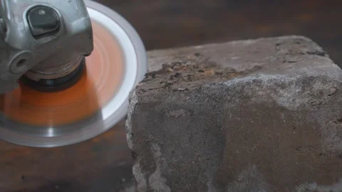 Angle grinder creating bright sparks while cutting metal Stock Footage 327401408