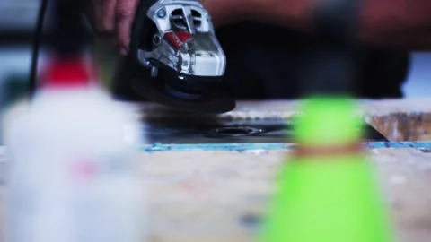 Angle Grinder Cutting Circular Hole In Stone Slab, Workshop, Close Up Shot Stock Footage 340340850
