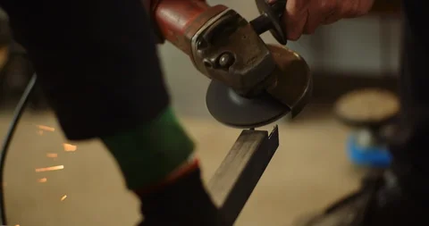 Angle Grinder Cutting Metal at Workshop Stock Footage 127184888