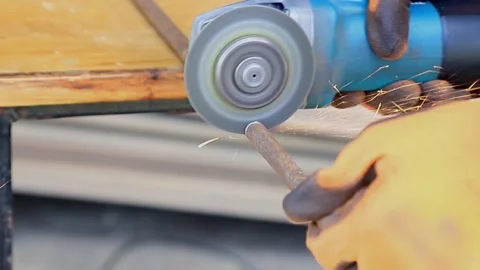 Angle grinder cutting steel Stock Footage 151563133