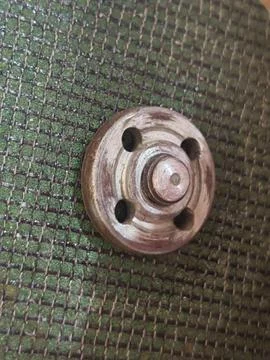 Angle Grinder Flange Nut on Abrasive Woven Backing Stock Photos