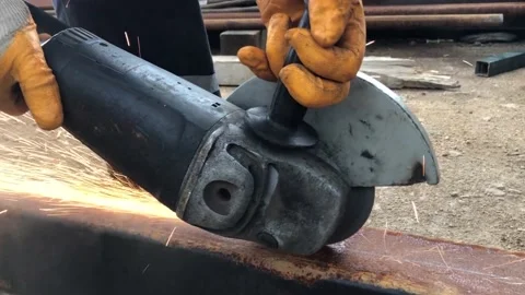 Angle grinder with grinding in iron - Sanding manual worker Stock Footage 143651670