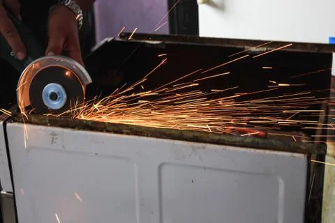 Angle grinder sparks close-up Stock Photos