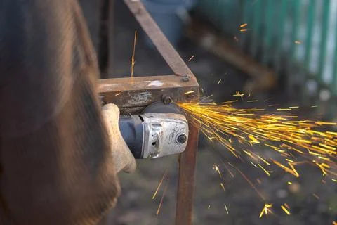 Angle Grinder Sparks Old Metal Worker cutting Old Metal using angular grin... Fotos Stock