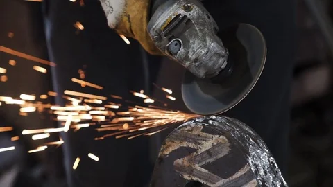 Angle Grinder Sparks Old MetalWorker cutting Old Metal using angular grinding Video stock 88299238