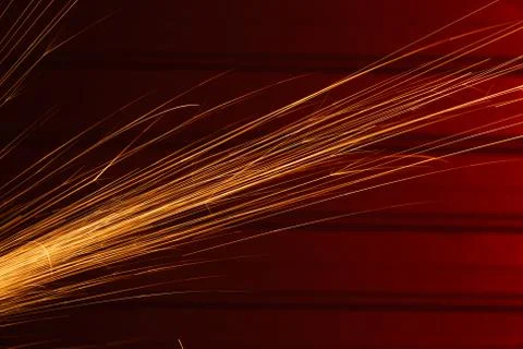 Angle grinder sparks on red background Foto stock