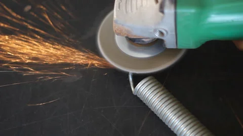 Angle Grinder of Steel spring Stock Footage 52994454
