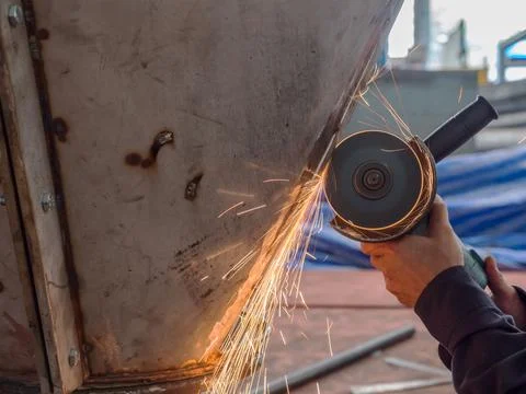 Angle grinder in use Stock Photos