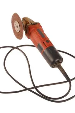 An angle grinder on a white background. Stock Photos