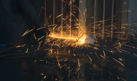 Angle grinder in a workshop producing sparks Stock Photos