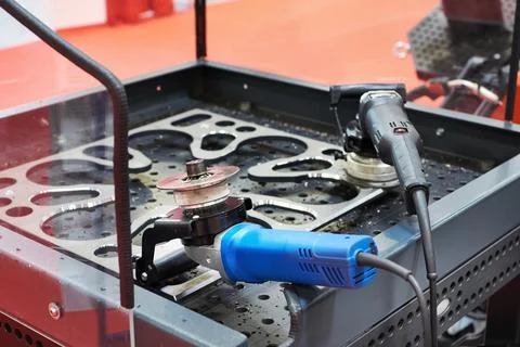 Angle grinders on workplace Stock Photos