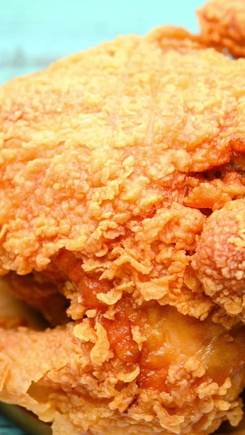Angle pan deep fried chicken at vertical composition Stock Footage 245167000
