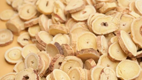 Angle pan herb BeiQi or Huang Qi or Radix Astragali or Astragalus Root Stock Footage 289344069