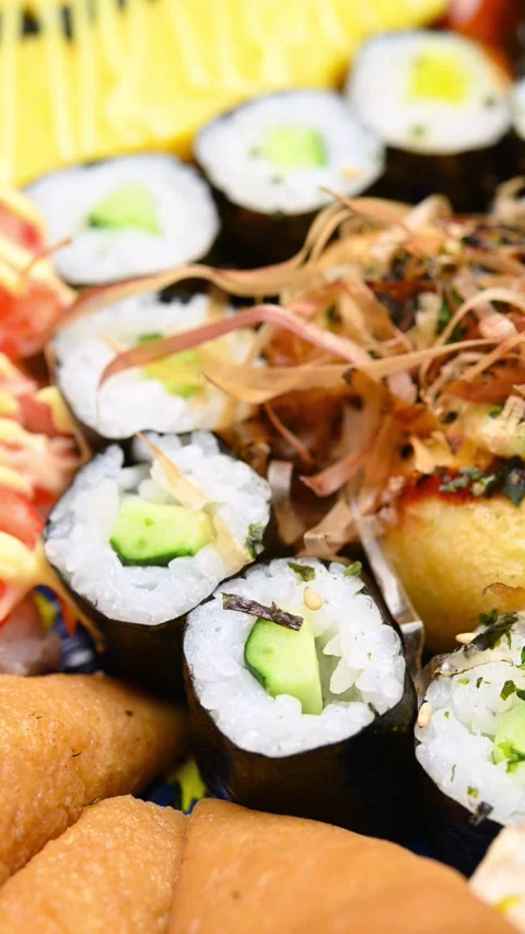 Angle pan various sushi closeup at vertical composition Stock Footage 234797878