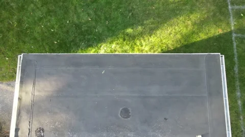 Angle rise up, short length of flat roof... | Stock Video | Pond5