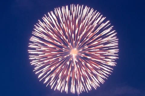 Angle shot of colored firework with blue background Stock Photos