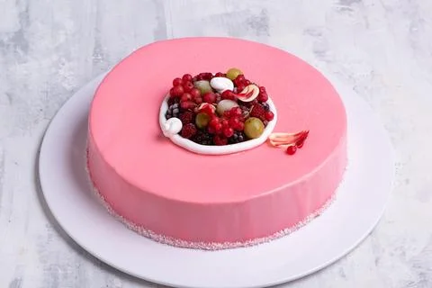 Angle shot of one piece cut from a beautiful berry mouse cake. Fotos Stock