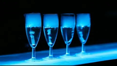 Angle view on colorfull boiling glasses in the bar Stock Footage 10889063