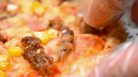 Angle view eating fresh pizza with beef and bacon Stock Footage 150601855