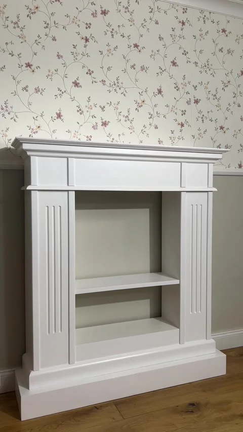 Angle view of handmade white wooden fireplace mantel custom woodwork 4K vertical Stock-Footage 341953362
