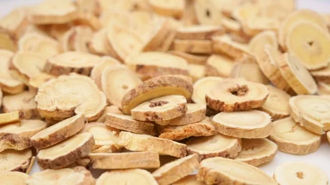 Angle view herb BeiQi or Huang Qi or Radix Astragali or Astragalus Root Stock Footage 294536237