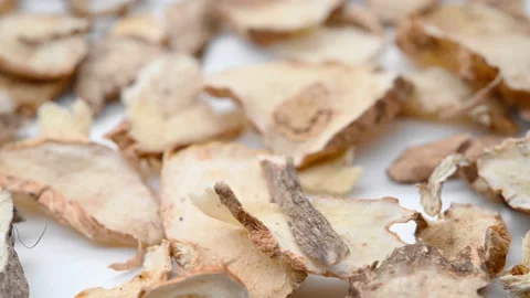 Angle view herb ZhiMu or Anemarrhenae Rhizoma or Common Anemarrhena rotating Stock Footage 159734779