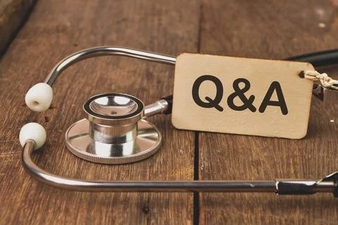 Angle view of stethoscope and label tag written with Q&amp;A. Stock-Fotos