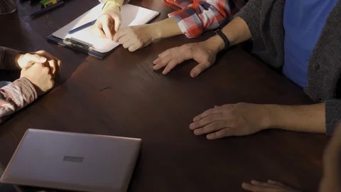 Angle view of team looking at professionals group shaking hands in creative Video stock 126241950