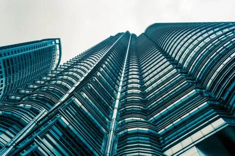 Angle view to textured background of modern glass building skyscrapers Stock Photos