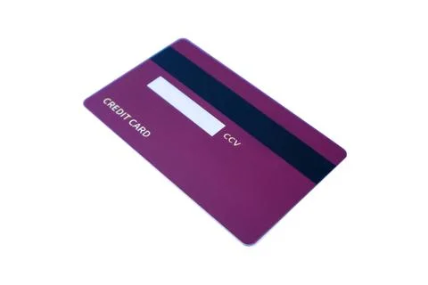Angled back view of a purple credit card with magnetic stripe and CCV panel Stock Photos