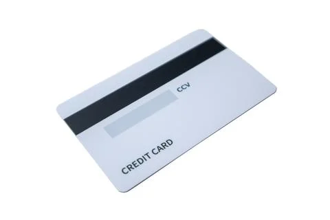 Angled back view of a white credit card with magnetic stripe and CCV panel .. Stock Photos