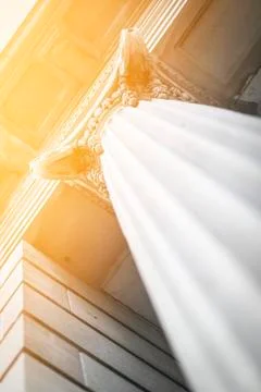 Angled Classic Courthouse Column Building At Sunset Stock Photos
