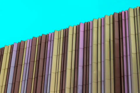 Angled clean shoot of colorful composite wall with edited open green - blue s Stock-Fotos